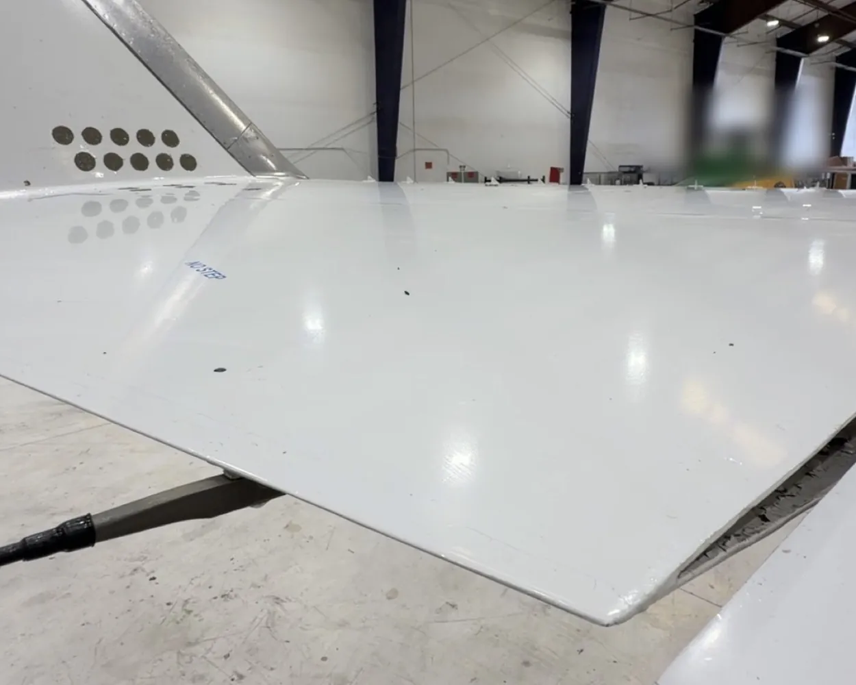 The same panel after the visit, back to a gloss finish