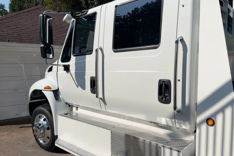 A white truck after the detail, its chrome and paint clean